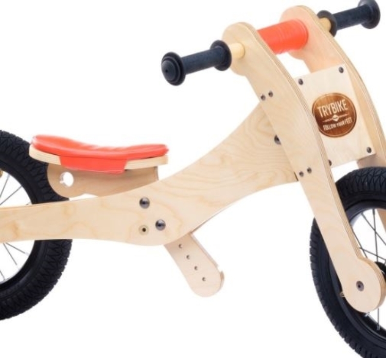 Afbeeldingen van Trybike zadelhoes en kinbeschermer Oranje – voor de Houten Trybike