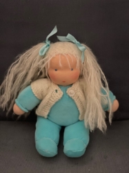 Picture of SALE!!!  Pop Antroposofisch Liselotje licht blauw met wol gebreid vestje Nicky velours met schapenvol vulling