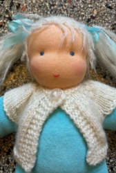 Picture of SALE!!!  Pop Antroposofisch Liselotje licht blauw met wol gebreid vestje Nicky velours met schapenvol vulling