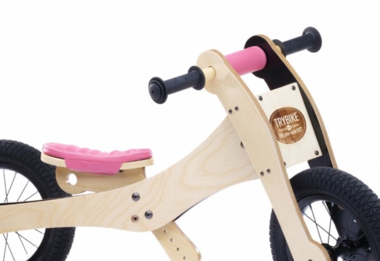 Afbeeldingen van Trybike zadelhoes en kinbeschermer Roze – voor de Houten Trybike