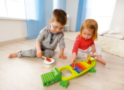 HABA Klankkrokodil Xylofoon Spelende kinderen